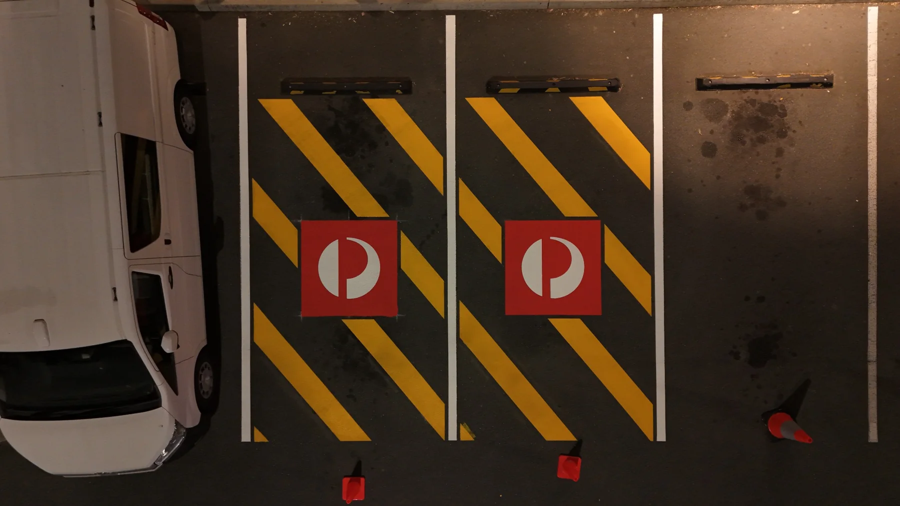 Straight-down overhead drone photo of both newly marked Australia Post bays